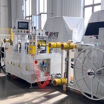 Externally mounted pre-welded outlet irrigation hose production line